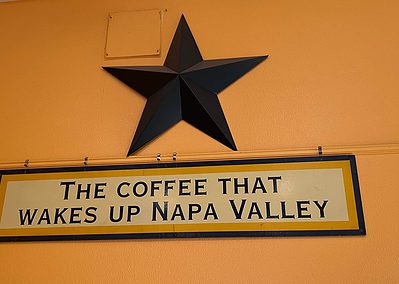 The coffee that wakes up Napa Valley sign